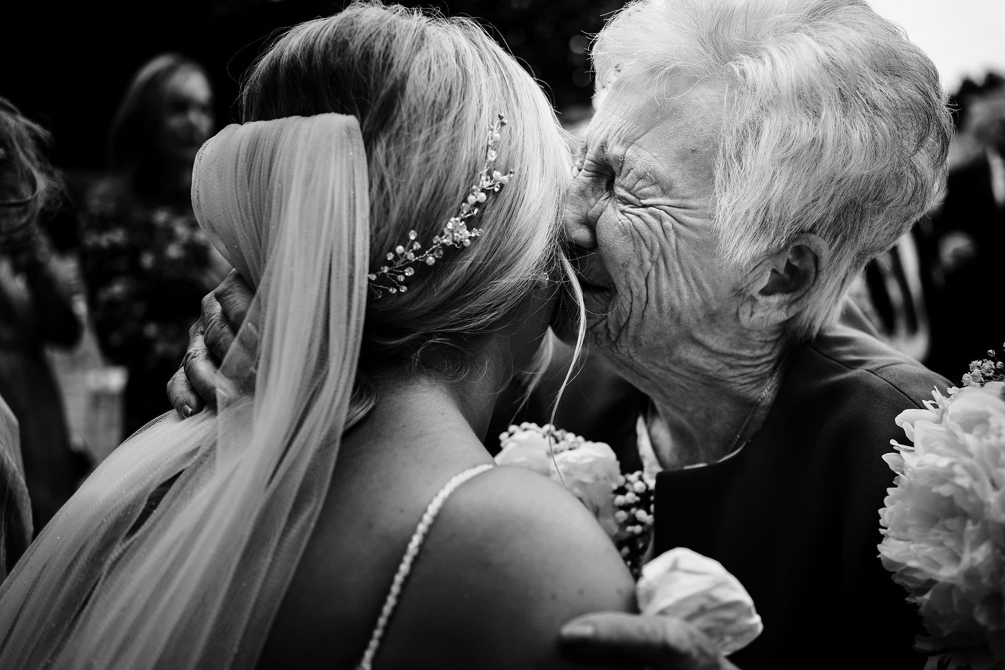 Candid wedding photograph showing a natural unscripted moment