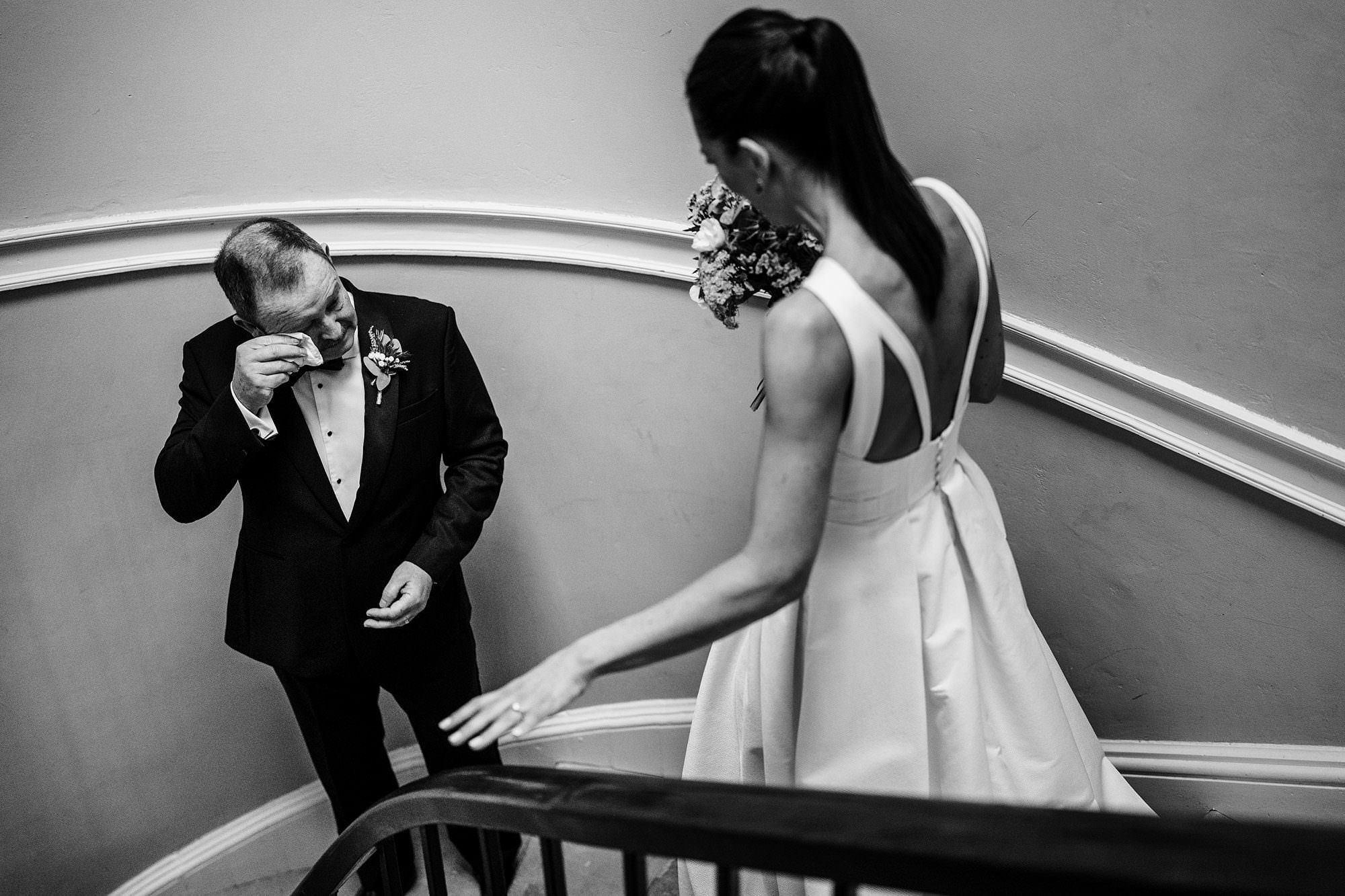 Bride approaching her emotional father before the ceremony at a Cotswolds wedding