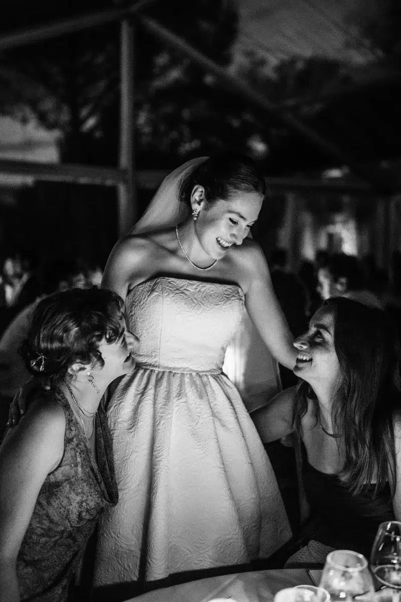 Bride spending time with guests wedding photo idea